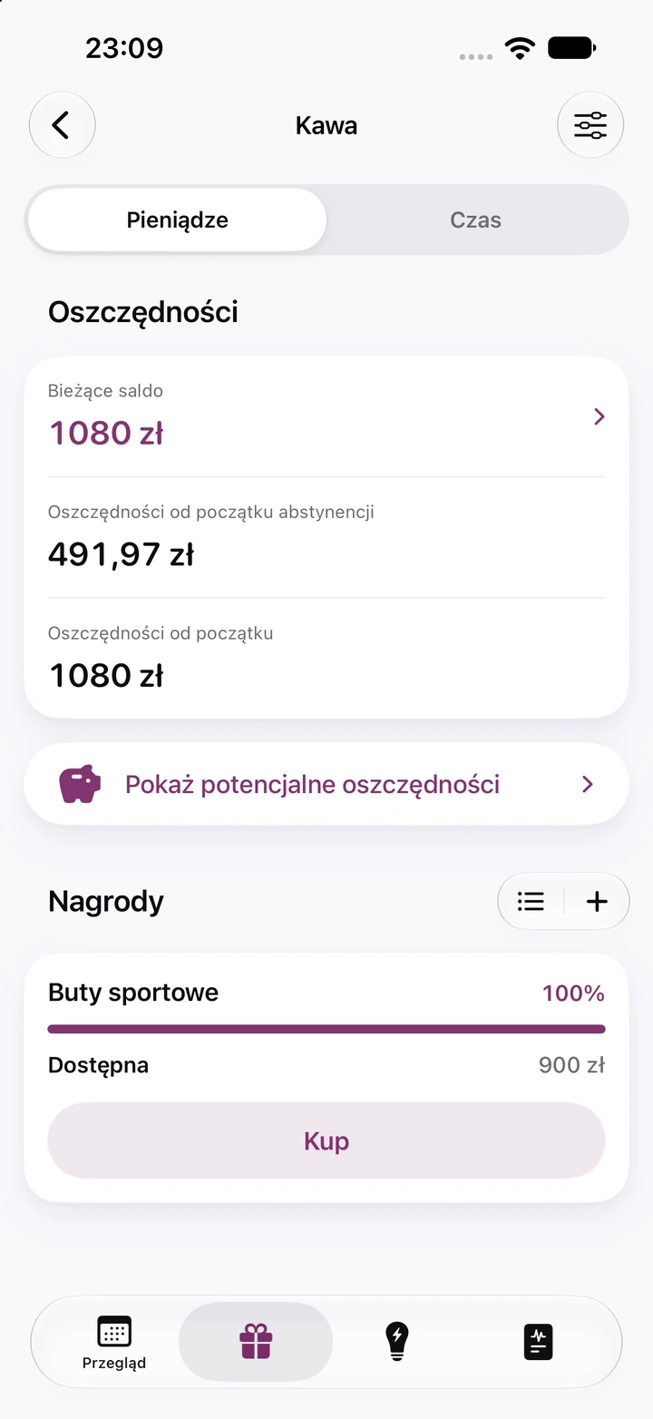 Ekran oszczędności dla kawy: bieżące saldo 1080 zł, 491,97 zł od początku abstynencji i nagroda „Buty sportowe” za 900 zł gotowa do kupienia