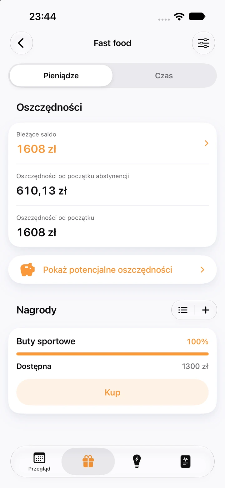Ekran oszczędności dla fast foodów: bieżące saldo 1608 zł, 610,13 zł od początku abstynencji i nagroda „Buty sportowe” za 1300 zł na 100%, gotowa do kupienia