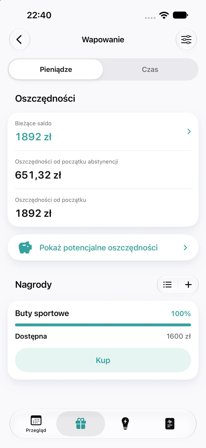 Zakładka „Pieniądze” dla wapowania: bieżące saldo 1892 zł, 651,32 zł oszczędności od początku abstynencji i nagroda „Buty sportowe” za 1600 zł na 100%, gotowa do kupienia